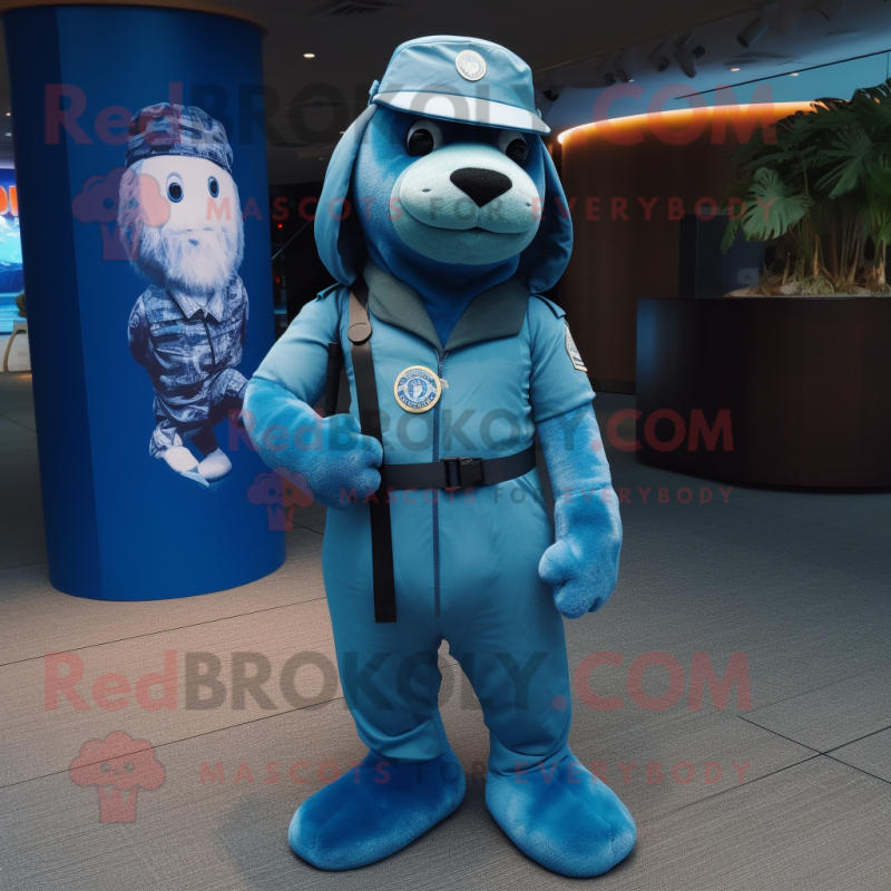 Cyan Navy Seal mascot costume character dressed with a One-Piece Swimsuit and Keychains Cyan Navy Seal mascot costume character dressed with a One-Piece Swimsuit and Keychains