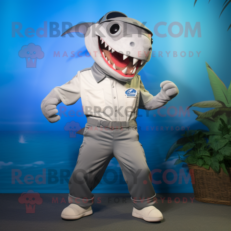 Silver Shark mascot costume character dressed with a Bermuda Shorts and Suspenders