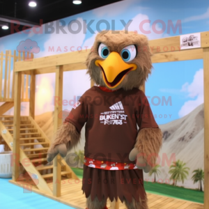 Brown Eagle mascot costume character dressed with a Board Shorts and Headbands