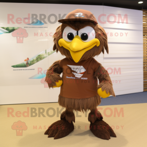 Brown Eagle mascot costume character dressed with a Board Shorts and Headbands
