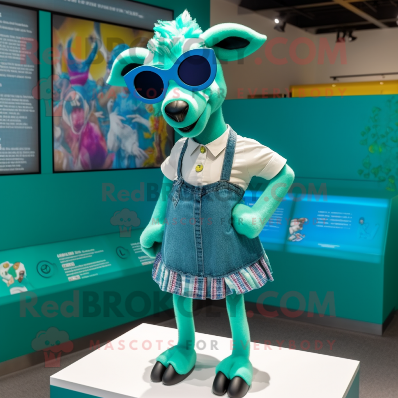 Teal Goat mascot costume character dressed with a Mini Skirt and Sunglasses Teal Goat mascot costume character dressed with a Mini Skirt and Sunglasses