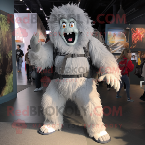 Gray Yeti mascot costume character dressed with a Bodysuit and Backpacks