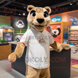 Tan Puma mascot costume character dressed with a Polo Tee and Shawl pins