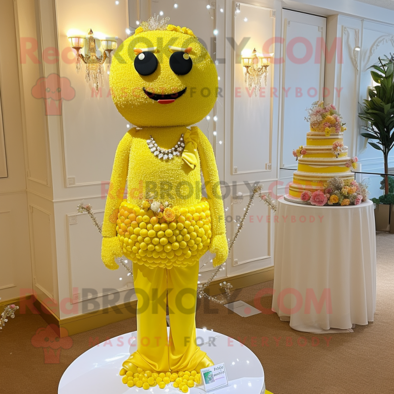 Lemon Yellow Wedding Cake mascot costume character dressed with a Jumpsuit and Necklaces