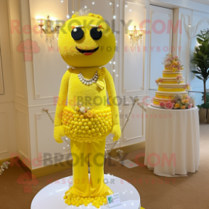 Lemon Yellow Wedding Cake mascot costume character dressed with a Jumpsuit and Necklaces