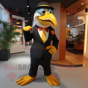 Gold Toucan mascot costume character dressed with a Suit Pants and Gloves