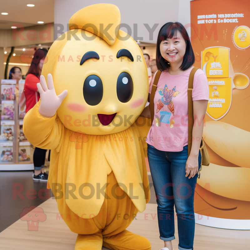 Gold Plum mascot costume character dressed with a Mom Jeans and Earrings Gold Plum mascot costume character dressed with a Mom Jeans and Earrings