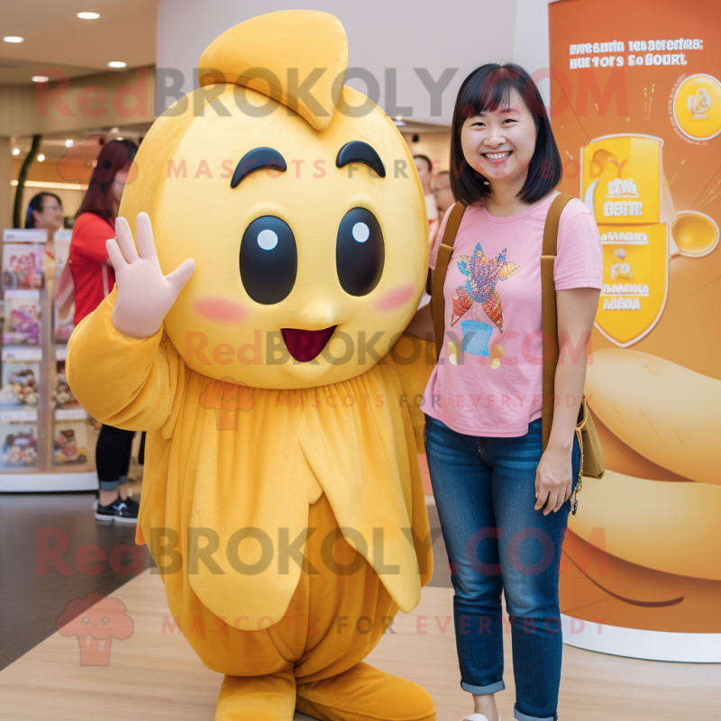 Gold Plum mascot costume character dressed with a Mom Jeans and Earrings