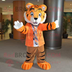 Orange Tiger mascot costume character dressed with a Button-Up Shirt and Shawls