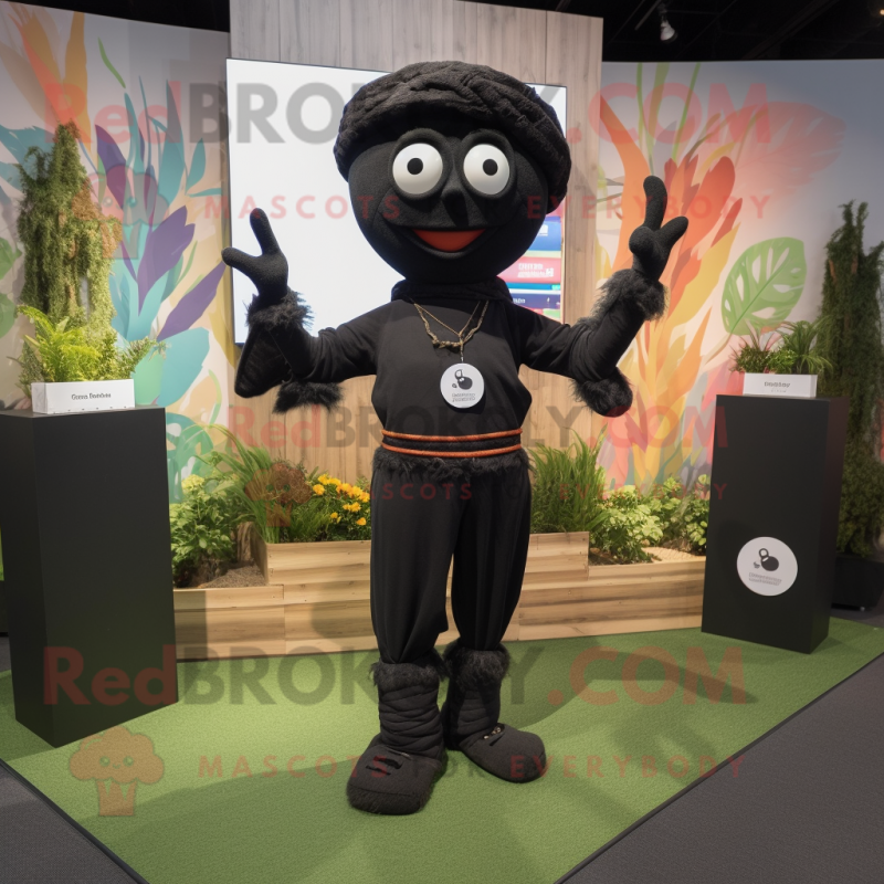 Black Scarecrow mascot costume character dressed with a Yoga Pants and Earrings Black Scarecrow mascot costume character dressed with a Yoga Pants and Earrings