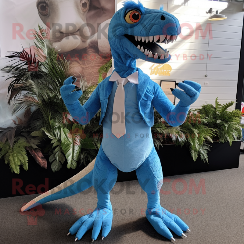 Sky Blue Deinonychus mascot costume character dressed with a Suit and Suspenders Sky Blue Deinonychus mascot costume character dressed with a Suit and Suspenders