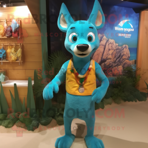 Turquoise Dingo mascot costume character dressed with a Swimwear and Bracelets