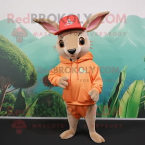 Peach Kangaroo mascot costume character dressed with a Hoodie and Hat pins