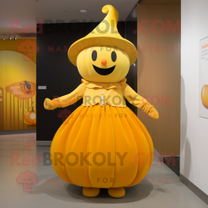Gold Pumpkin mascot costume character dressed with a Dress and Berets