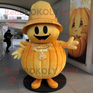 Gold Pumpkin mascot costume character dressed with a Dress and Berets