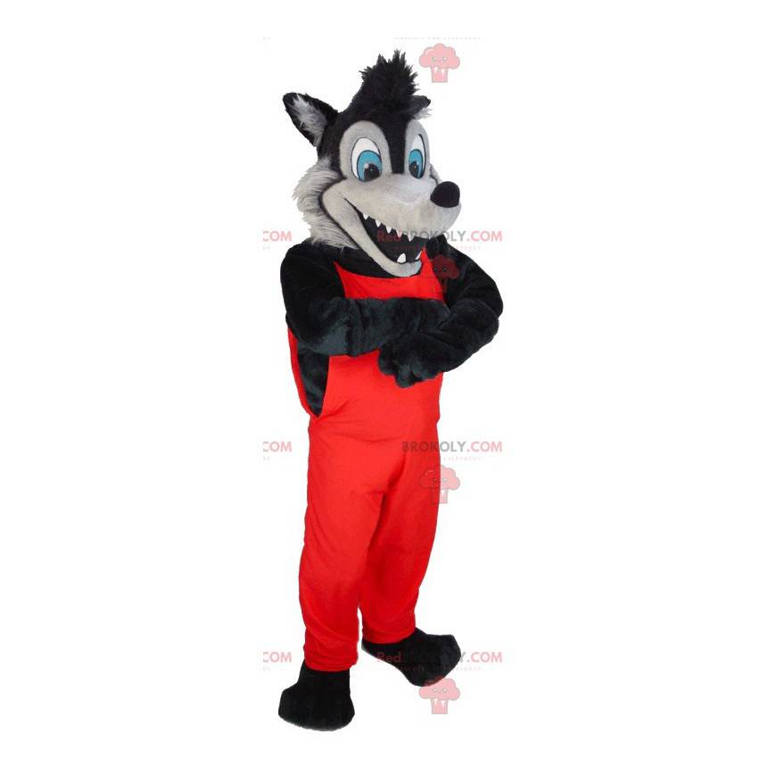 Mascotte de loup noir et gris en salopette rouge -