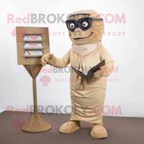 Tan Mummy mascot costume character dressed with a Blazer and Reading glasses