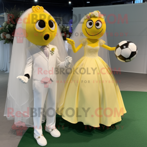 Yellow Soccer Ball mascot costume character dressed with a Wedding Dress and Keychains