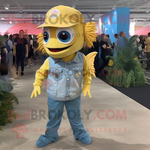 Yellow Betta Fish mascot costume character dressed with a Chambray Shirt and Foot pads