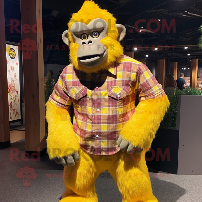 Yellow Gorilla mascot costume character dressed with a Flannel Shirt and Keychains Yellow Gorilla mascot costume character dressed with a Flannel Shirt and Keychains