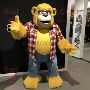 Yellow Gorilla mascot costume character dressed with a Flannel Shirt and Keychains