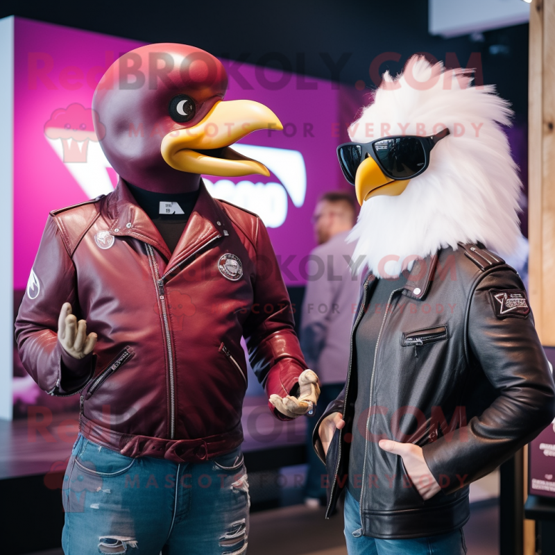 Magenta Seagull mascot costume character dressed with a Biker Jacket and Watches Magenta Seagull mascot costume character dressed with a Biker Jacket and Watches