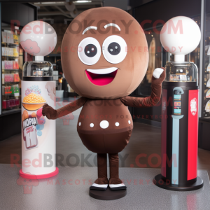 Brown Gumball Machine mascot costume character dressed with a Yoga Pants and Tie pins