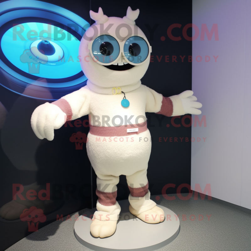 Cream Cyclops mascot costume character dressed with a Sweater and Bracelet watches Cream Cyclops mascot costume character dressed with a Sweater and Bracelet watches