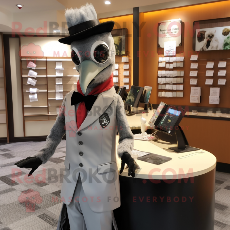 Silver Woodpecker mascot costume character dressed with a Suit and Suspenders Silver Woodpecker mascot costume character dressed with a Suit and Suspenders