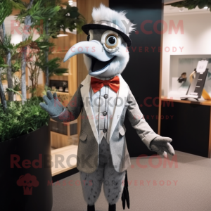 Silver Woodpecker mascot costume character dressed with a Suit and Suspenders