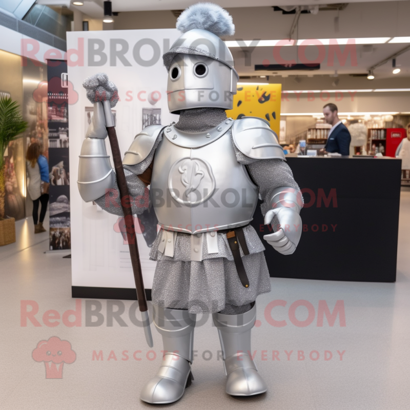 Silver Roman Soldier mascot costume character dressed with a Button-Up Shirt and Clutch bags