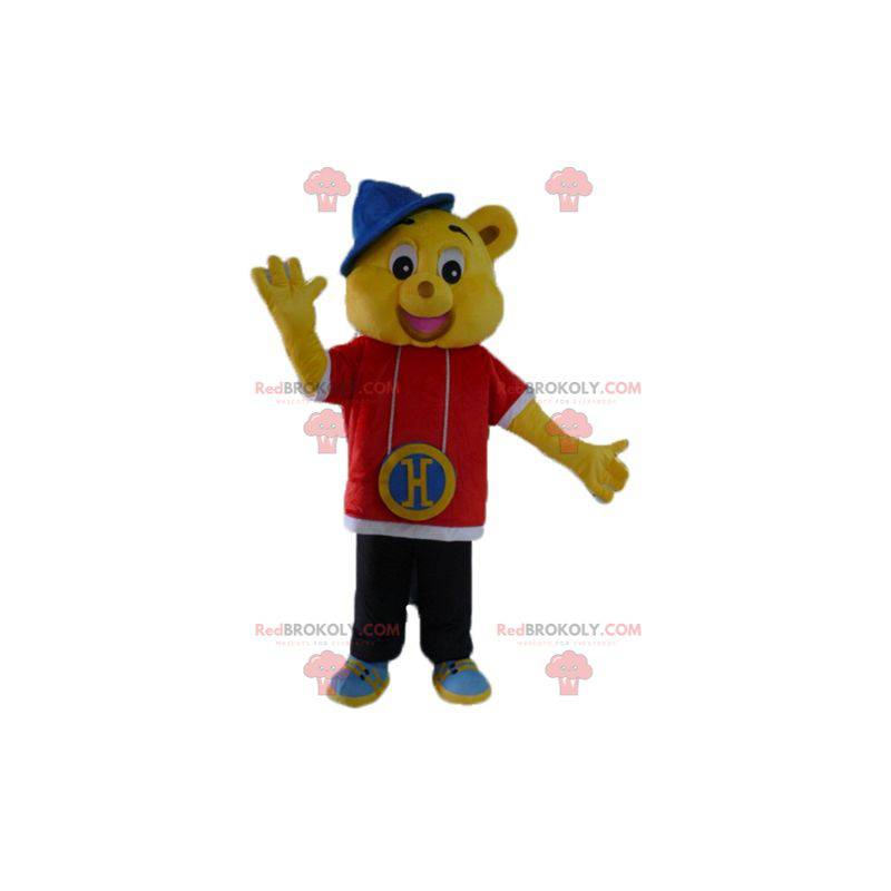 Mascota oso amarillo vestida con traje de rapero hip-hop -