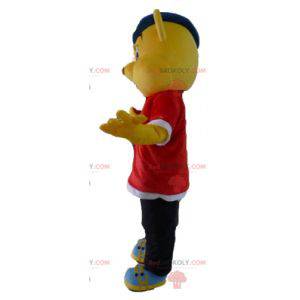 Mascotte orso giallo vestito con un abito rapper hip-hop -