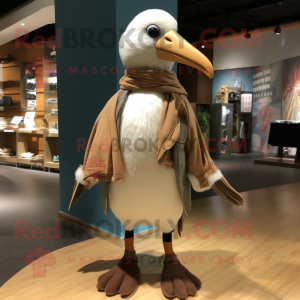 Tan Albatross mascot costume character dressed with a Trousers and Scarves