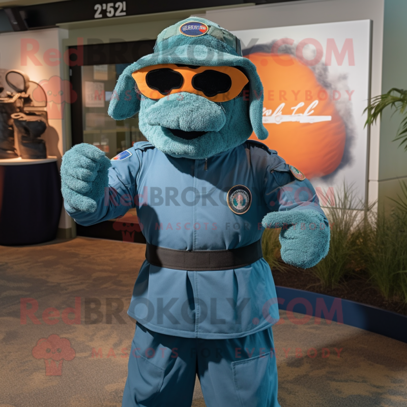 Cyan Navy Seal mascot costume character dressed with a Bermuda Shorts and Headbands