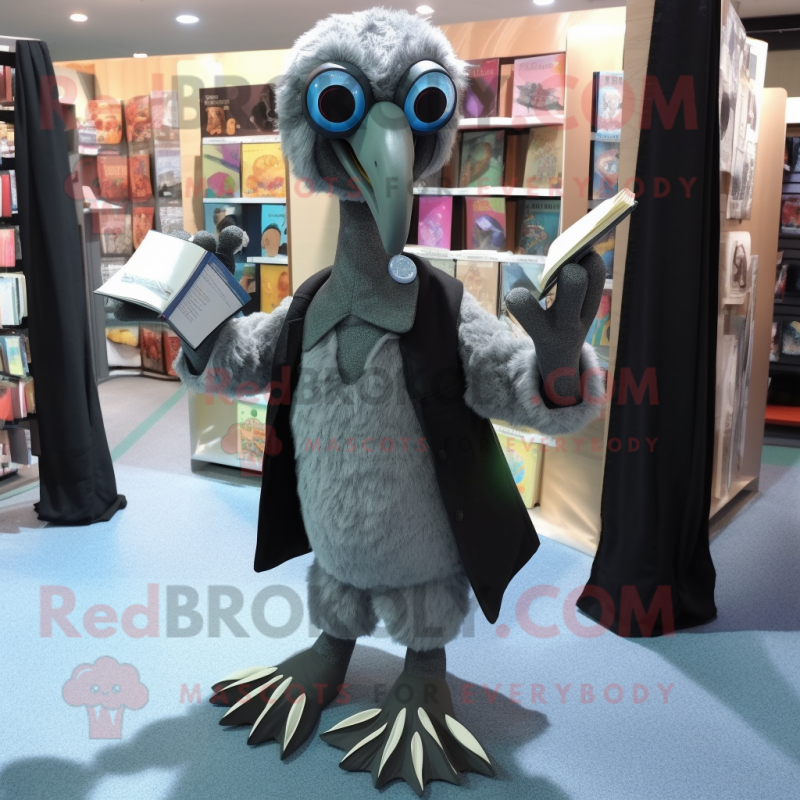 Gray Dodo Bird mascot costume character dressed with a Dress Pants and Reading glasses