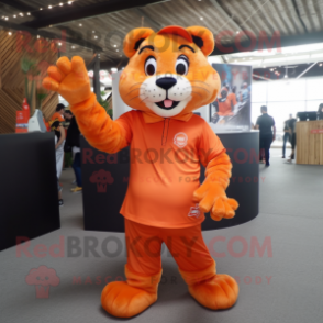 Orange Panther mascot costume character dressed with a Polo Tee and Hair clips