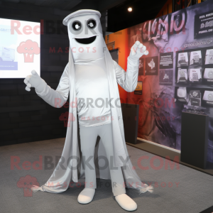 Silver Ghost mascot costume character dressed with a Skinny Jeans and Ties