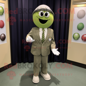 Olive Golf Ball mascot costume character dressed with a Blazer and Shoe clips