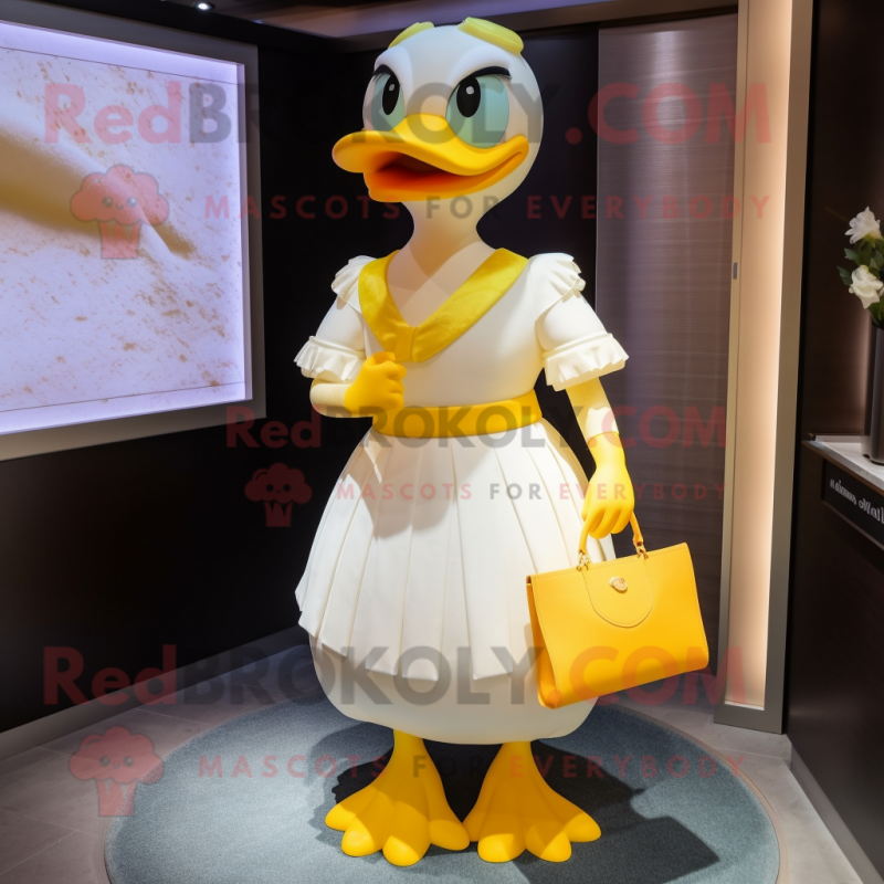 Yellow Geese mascot costume character dressed with a Wedding Dress and Clutch bags Yellow Geese mascot costume character dressed with a Wedding Dress and Clutch bags