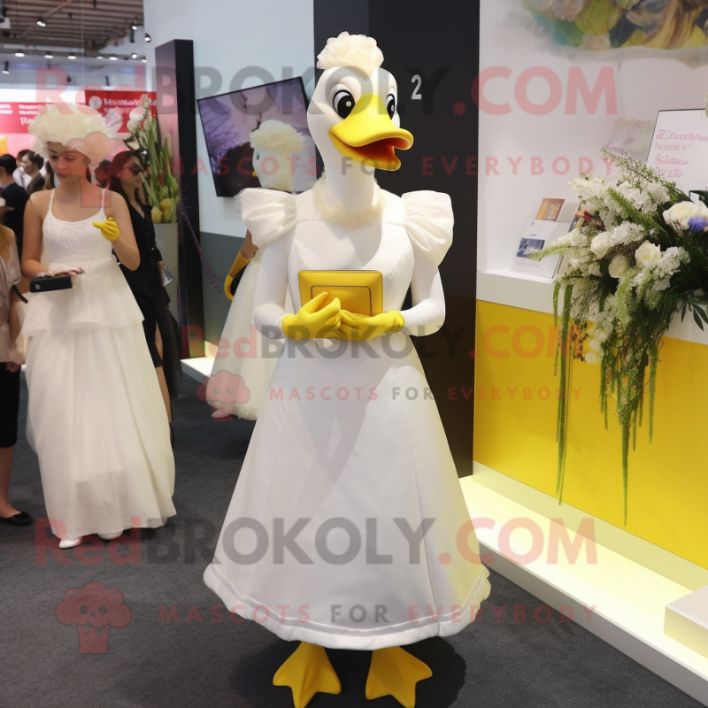 Yellow Geese mascot costume character dressed with a Wedding Dress and Clutch bags