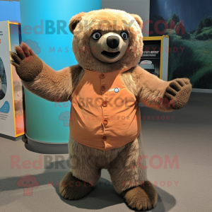Peach Sloth Bear mascot costume character dressed with a Graphic Tee and Mittens