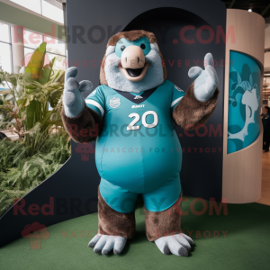 Teal Giant Sloth mascot costume character dressed with a Rugby Shirt and Rings