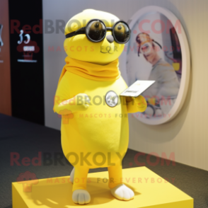 Lemon Yellow Seal mascot costume character dressed with a T-Shirt and Eyeglasses
