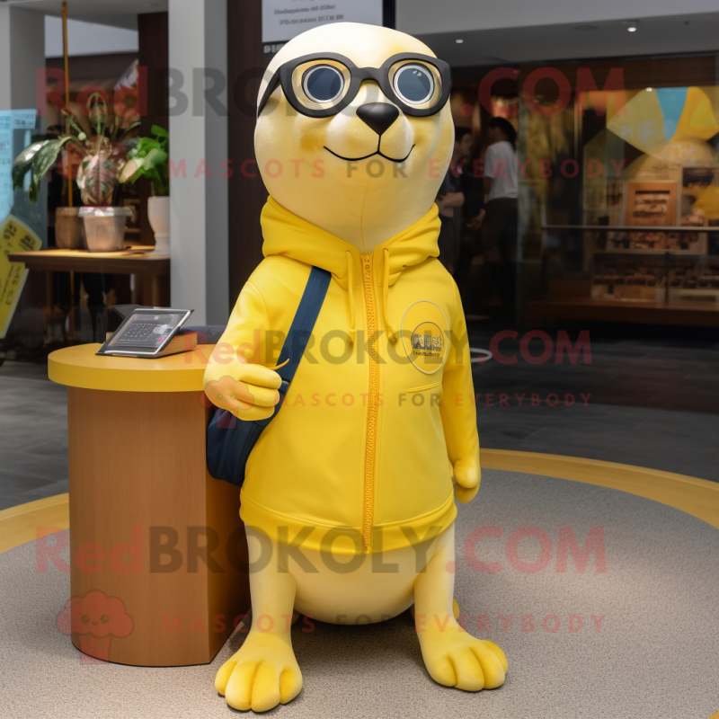 Lemon Yellow Seal mascot costume character dressed with a T-Shirt and Eyeglasses