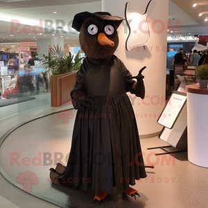 Brown Blackbird mascot costume character dressed with a Evening Gown and Eyeglasses