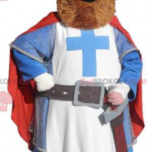 Mascotte cavaliere vestita di rosso blu e bianco -