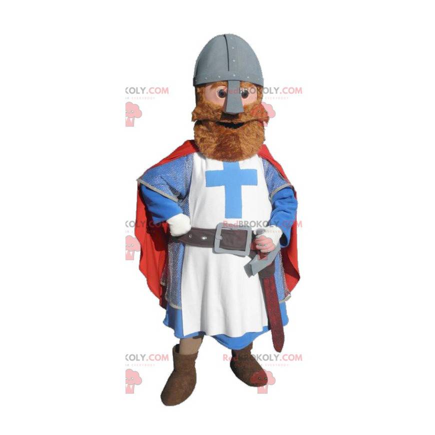 Mascotte de chevalier habillé en rouge bleu et blanc -