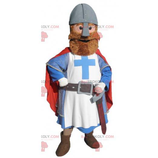 Cavaleiro mascote vestido de vermelho, azul e branco -