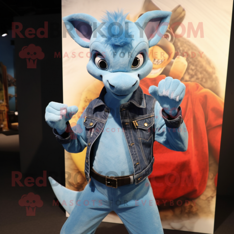 Sky Blue Chupacabra mascot costume character dressed with a Denim Shirt and Gloves